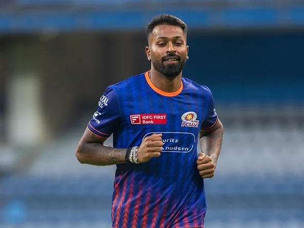 Mumbai Indians players strategizing ahead of IPL 2025 opener, missing Hardik Pandya due to his slow over-rate suspension.